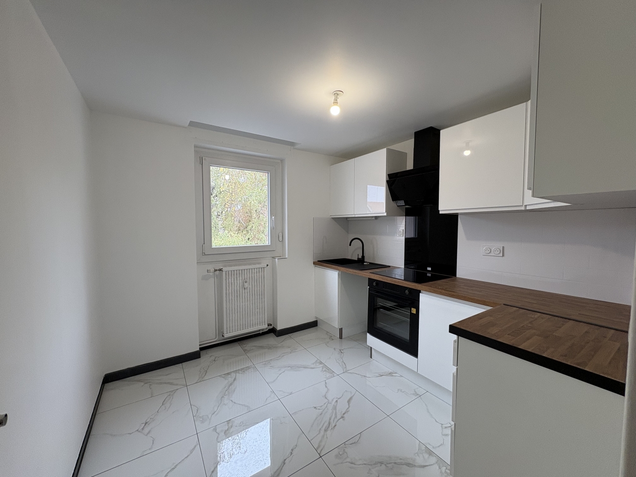 APPARTEMENT TYPE 3 RÉNOVÉ AVEC GARAGE